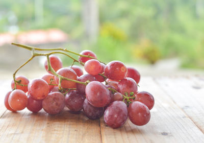 Close-up of grapes on table