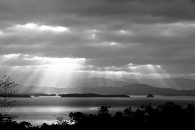 Scenic view of sea against dramatic sky