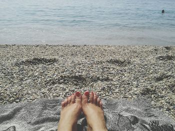 Low section of woman on beach