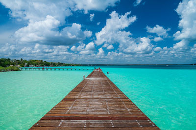 Pier over the wonderful turquoise water in the bacalar lagoon, mexico