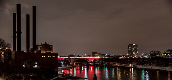 Reflection of illuminated buildings in water