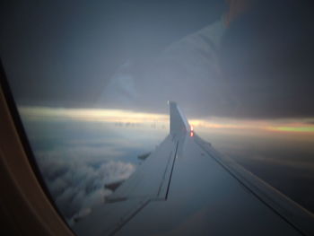 Cropped image of airplane wing