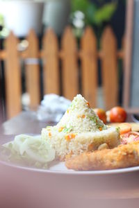 Organic fried rice in plate on table