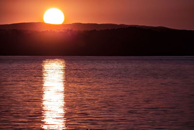 Scenic view of sunset over sea