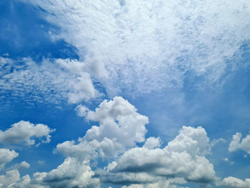 Sky and cloud background with a blue colored