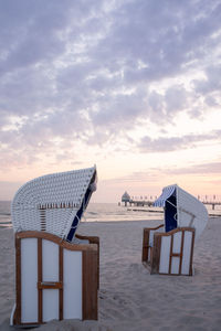 Two beach chair at the beach at sunrise