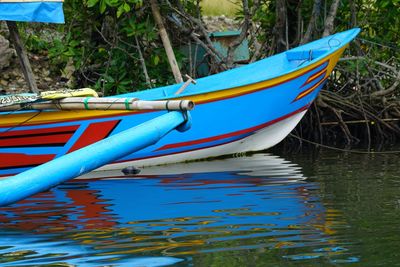 Boat moored in sea