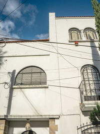 Low angle view of built structure against sky