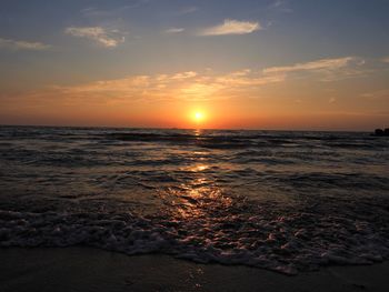 Scenic view of sea against sky during sunset