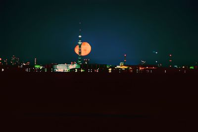 Illuminated city at night