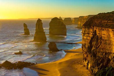 Scenic view of sea against clear sky during sunset