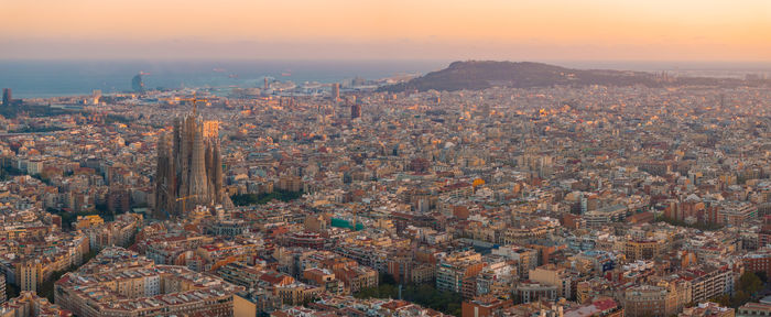 High angle view of townscape against sky during sunset