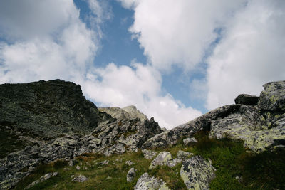 Low angle view of rocks against sky