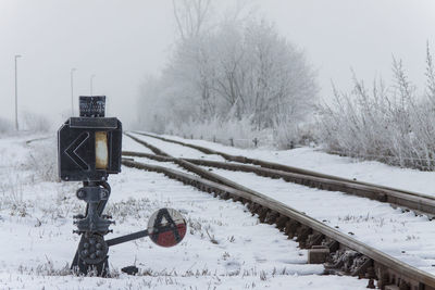 Train on railroad track during winter