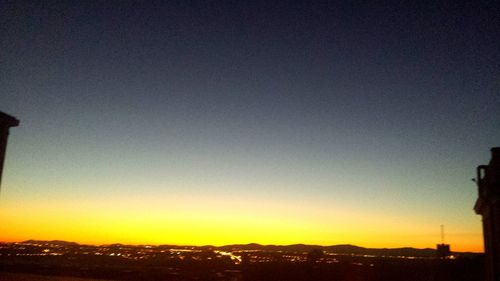 View of cityscape at sunset