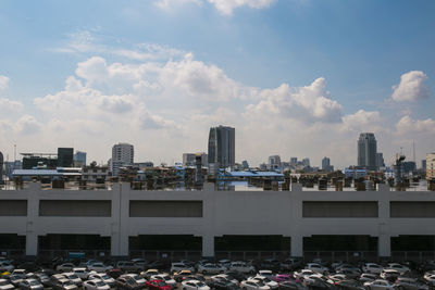 Buildings in city against sky