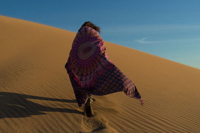 Full length of a desert against clear sky