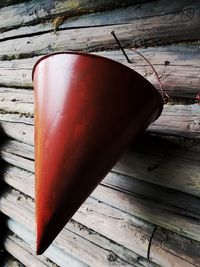 High angle view of abandoned boat on wooden plank