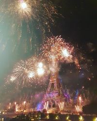 Firework display at night