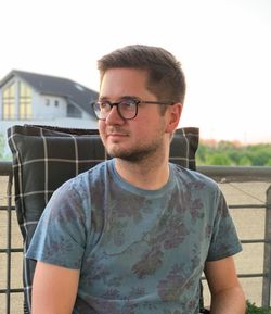 Portrait of young man standing outdoors