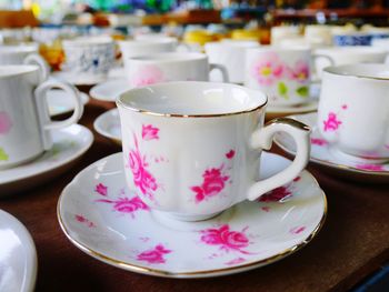 Close-up of coffee cup on table