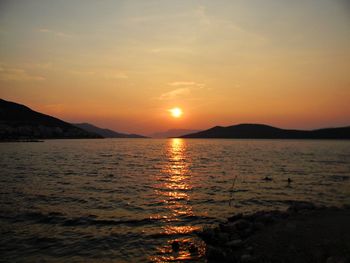 Scenic view of sea at sunset