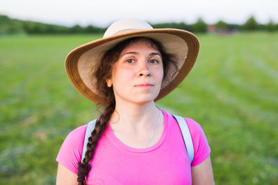 Portrait of a teenage girl wearing hat