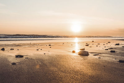 Scenic view of beach during sunset