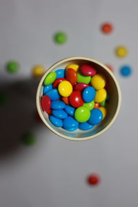 High angle view of multi colored balls on table