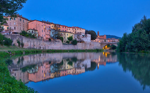 Reflection of buildings in lake