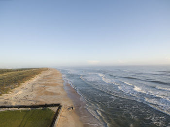 Scenic view of sea against clear sky