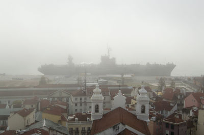 High angle view of townscape against sky in city