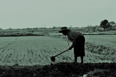 Man working on field