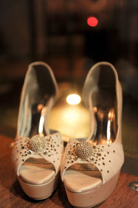 Close-up of wedding shoes on floor