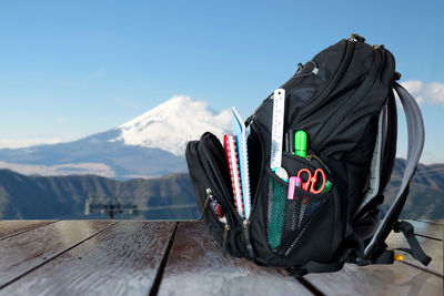 Backpack for the necessities of travel and tourism isolated on white background.