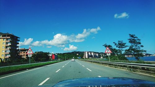 Road against cloudy sky