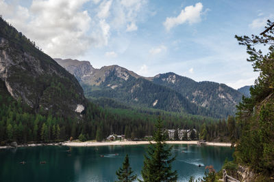 Scenic view of lake and mountains against sky