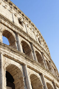 Low angle view of historical building against clear sky