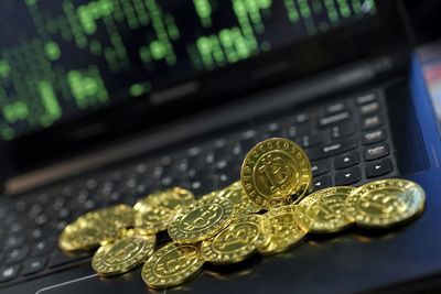 Close-up of coins on table