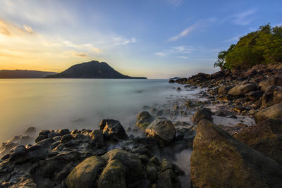 Scenic view of sea against sky during sunset