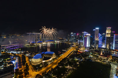 High angle view of illuminated buildings at night