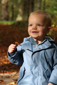 Portrait of cute boy smiling