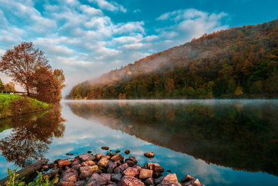 Morning fog on the saar loop near mettlach in germany.