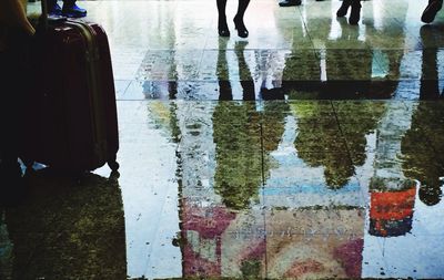 Low section of people standing in water