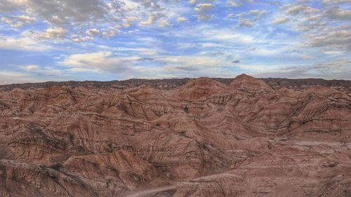 Scenic view of desert against sky