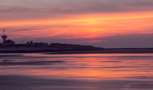 Scenic view of sea at sunset