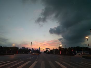 Cars on road at dusk