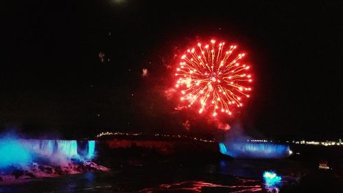 Firework display at night