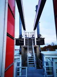 Low angle view of factory against sky