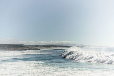 Scenic view of sea against clear sky